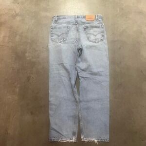 Vintage 90s light wash loose‎ fit Levi's 550 paper tag jeans